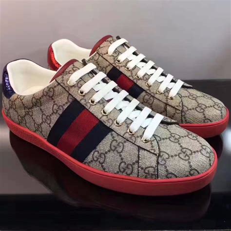 gucci sneaker red logo